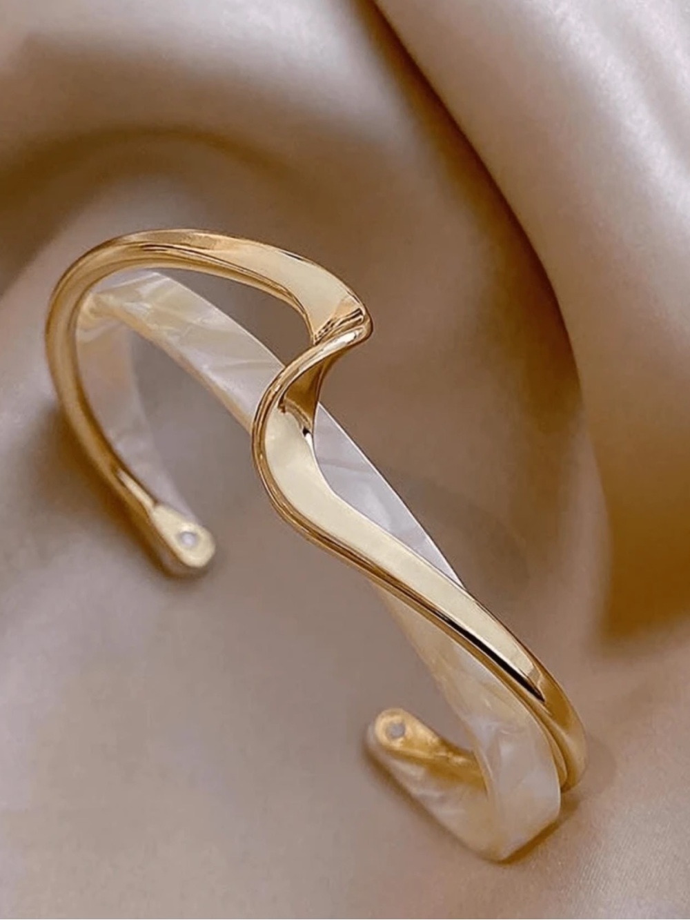 Elegant Gold and Pearl-Effect Wave Cuff Bracelet